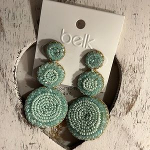 Beautiful, beaded, statement earrings by Belk. In light bluish green.